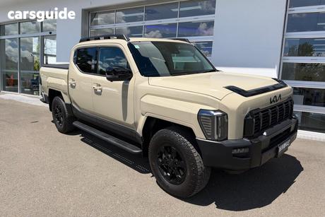Beige 2025 Kia Tasman Double Cab Pick Up X-Pro (4X4) (0.9T) Blck Fender