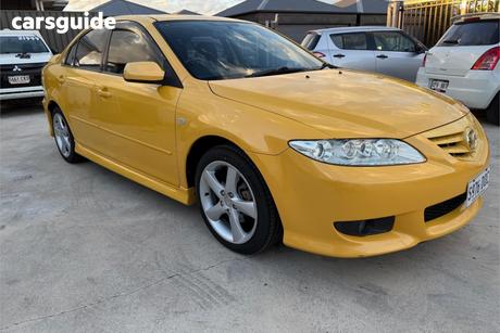 Yellow 2003 Mazda 6 Hatchback Luxury