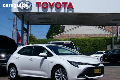 White 2023 Toyota Corolla Hatchback Ascent Sport Hybrid