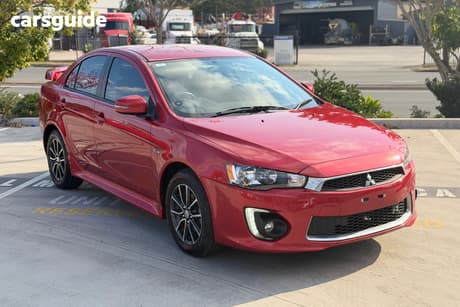 Red 2015 Mitsubishi Lancer Sedan Es Sport