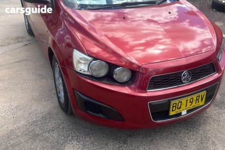 Red 2012 Holden Barina Sedan