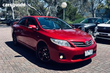 Red 2014 Toyota Corolla Sedan Ascent Sport