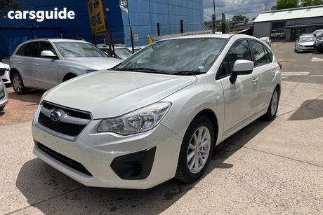 White 2014 Subaru Impreza Hatchback 2.0I (Awd)