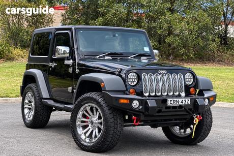 Black 2012 Jeep Wrangler Softtop Sport (4X4)