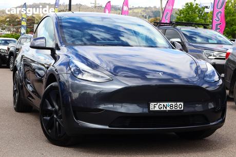 Grey 2024 Tesla Model Y Wagon Rear-Wheel Drive
