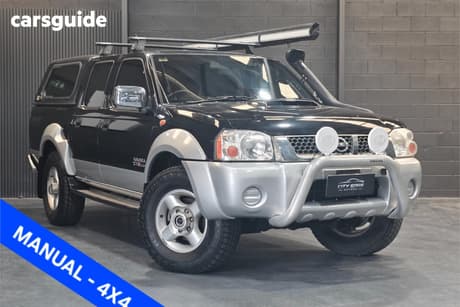 Black 2010 Nissan Navara Dual Cab Pick-up St-R (4X4)