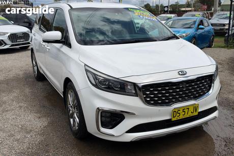 White 2019 Kia Carnival Wagon Platinum