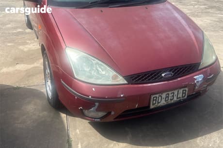 Red 2003 Ford Focus Sedan Cl