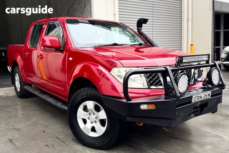 Red 2010 Nissan Navara Dual Cab Pick-up St (4X4)
