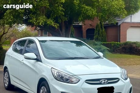 Cream 2015 Hyundai Accent Hatchback Active