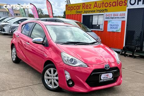 Pink 2015 Toyota Prius-C Hatchback Hybrid