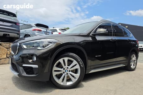 Brown 2015 BMW X1 Wagon Sdrive 20I