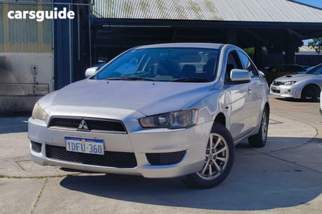 Orange 2009 Mitsubishi Lancer Sedan Es