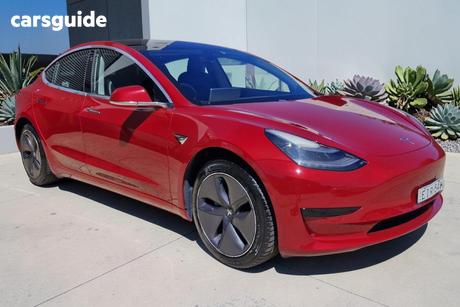 Red 2020 Tesla Model 3 Sedan Standard Range Rwd