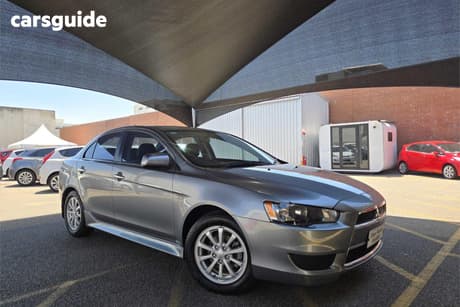 Silver 2012 Mitsubishi Lancer Sedan Lx