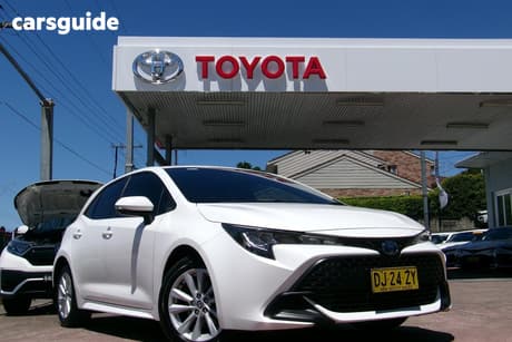 White 2023 Toyota Corolla Hatchback Ascent Sport Hybrid
