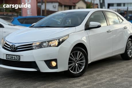 White 2014 Toyota Corolla Sedan Sx