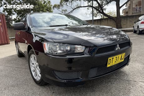 Black 2011 Mitsubishi Lancer Sedan Sx