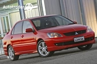Yellow 2007 Mitsubishi Lancer Sedan Vr-X