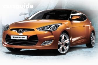 Orange 2015 Hyundai Veloster Coupe +