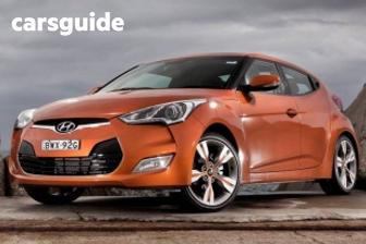 Silver 2012 Hyundai Veloster Coupe +