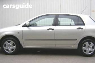 Red 2005 Toyota Corolla Hatchback Ascent Seca