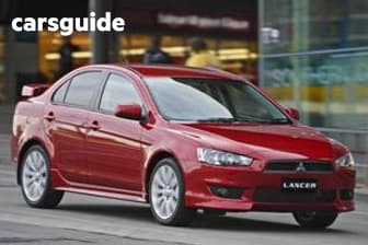 Red 2008 Mitsubishi Lancer Sedan Vr-X