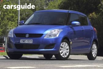Yellow 2012 Suzuki Swift Hatchback Ga