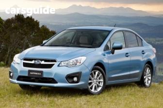 Orange 2012 Subaru Impreza Sedan 2.0I (Awd)