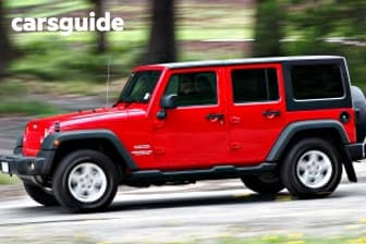 Silver 2015 Jeep Wrangler Unlimited Softtop Sport (4X4)