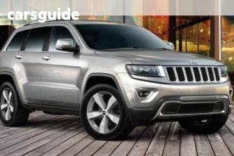 Red 2013 Jeep Grand Cherokee Wagon Laredo (4X4)