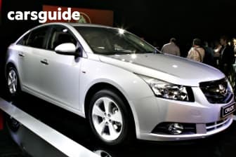 Red 2010 Holden Cruze Sedan Cd