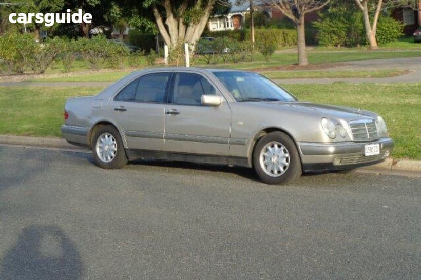 Yellow 1999 Mercedes-Benz E240 Sedan Elegance