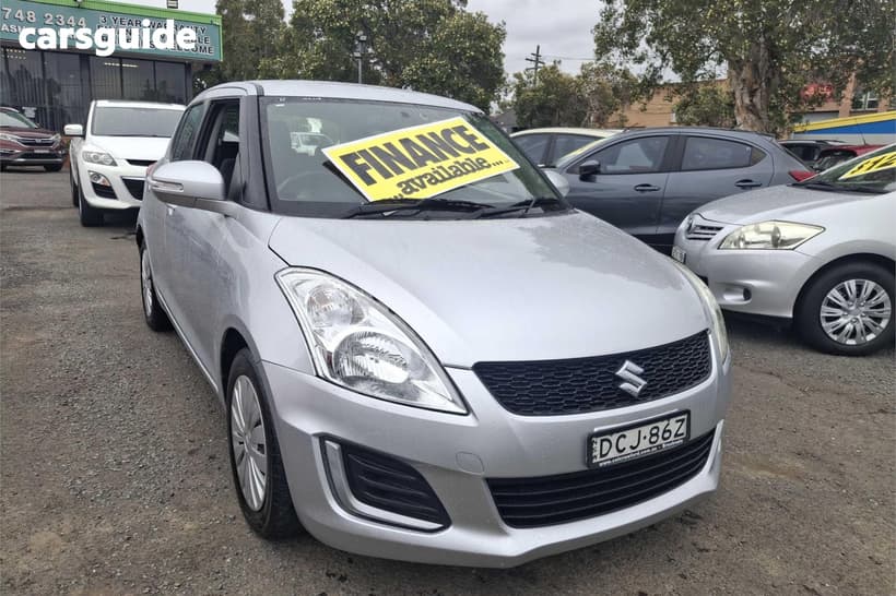 Silver 2015 Suzuki Swift Hatchback Gl