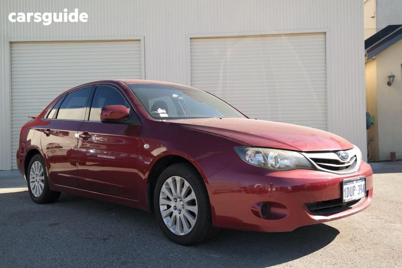 Red 2011 Subaru Impreza Sedan R (Awd)
