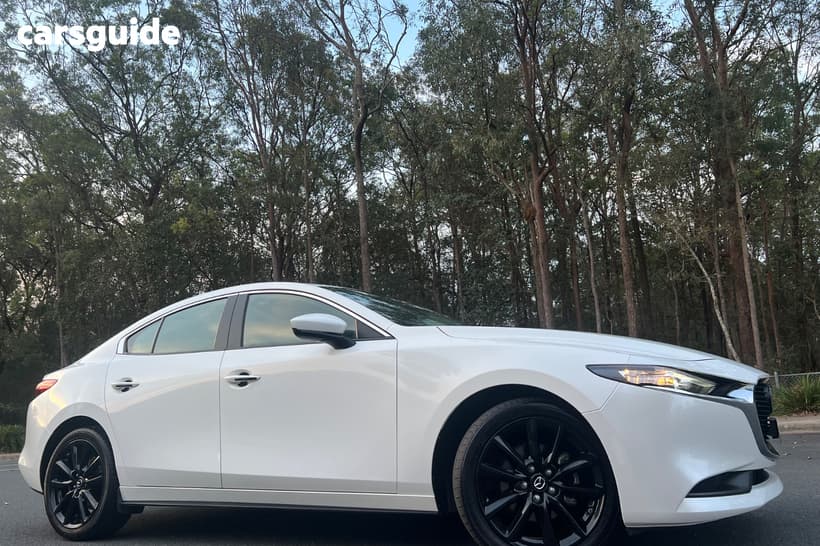 White 2023 Mazda 3 Sedan G20 Evolve Vision