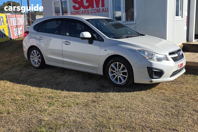 White 2015 Subaru Impreza Hatchback 2.0I (Awd)