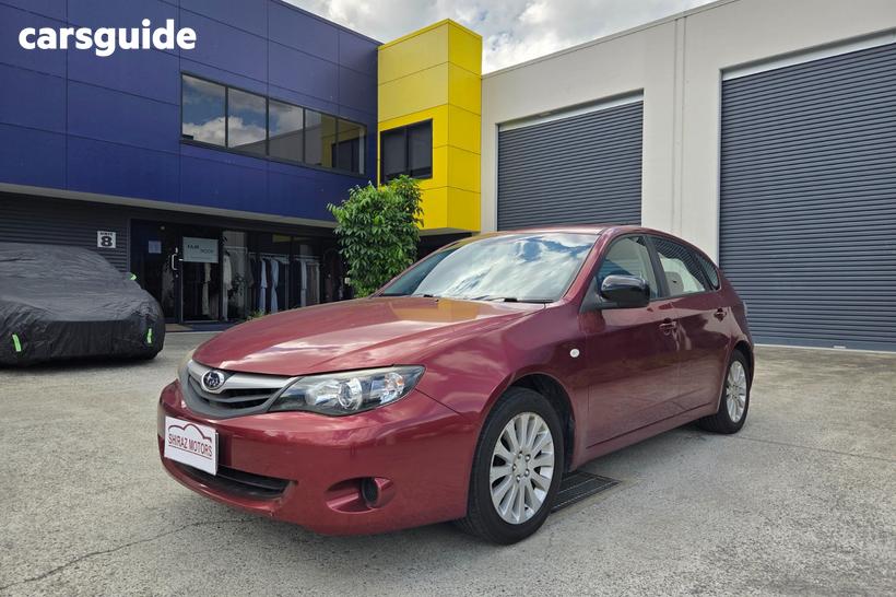 Burgundy 2010 Subaru Impreza Hatchback R (Awd)