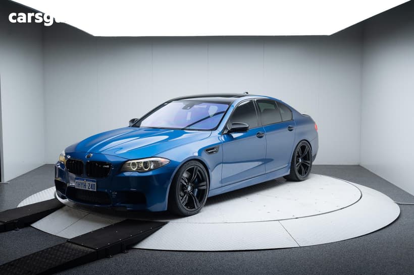 Blue 2012 BMW M5 Sedan