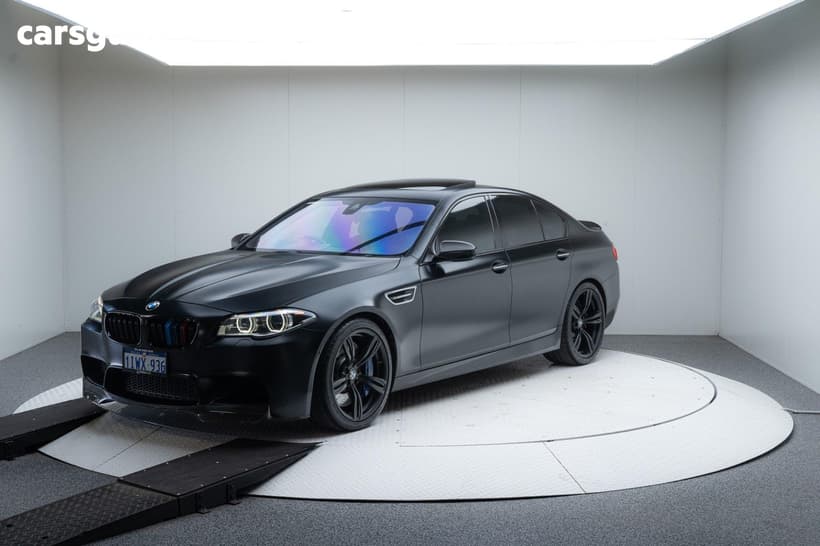Black 2015 BMW M5 Sedan