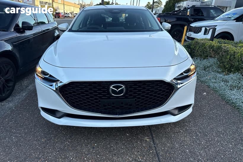 White 2024 Mazda 3 Sedan G20 Evolve
