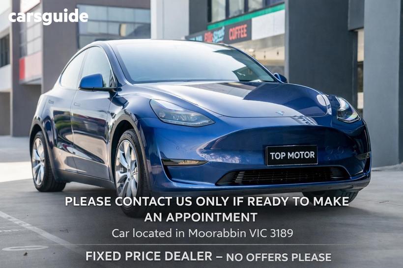 Blue 2023 Tesla Model Y Wagon Rear-Wheel Drive