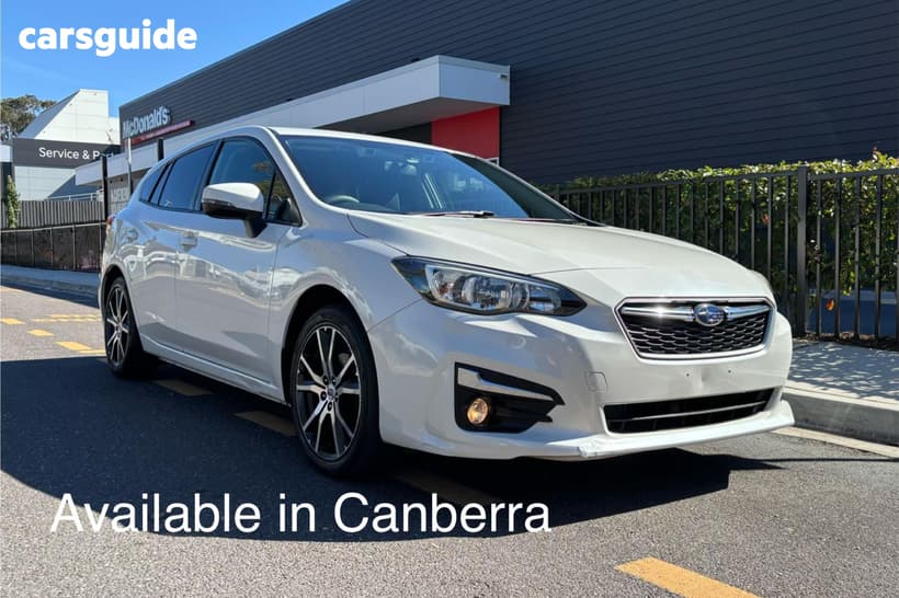 White 2016 Subaru Impreza Hatchback 2.0L (Awd)