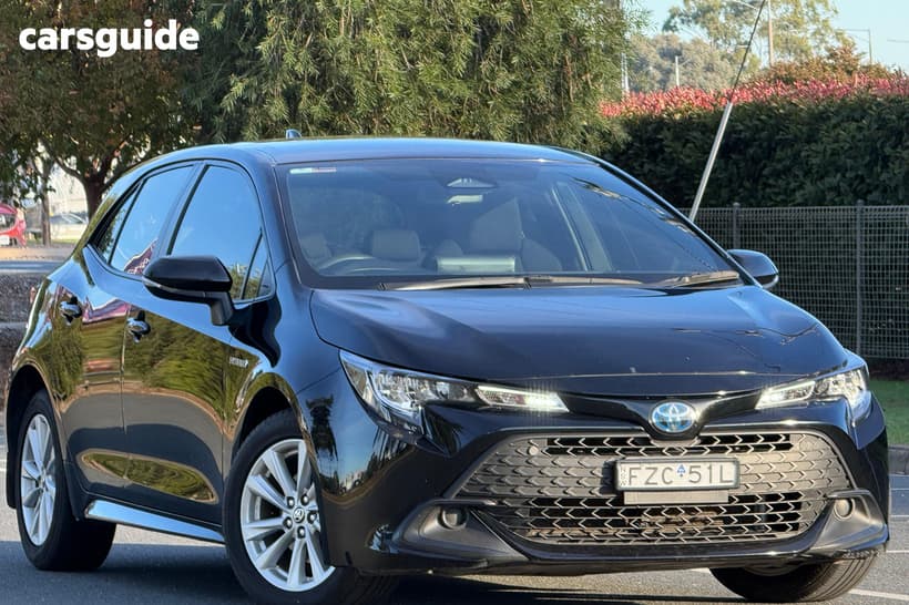 Black 2024 Toyota Corolla Hatchback Ascent Sport Hybrid