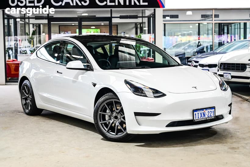 White 2021 Tesla Model 3 Sedan Standard Range Plus Rwd