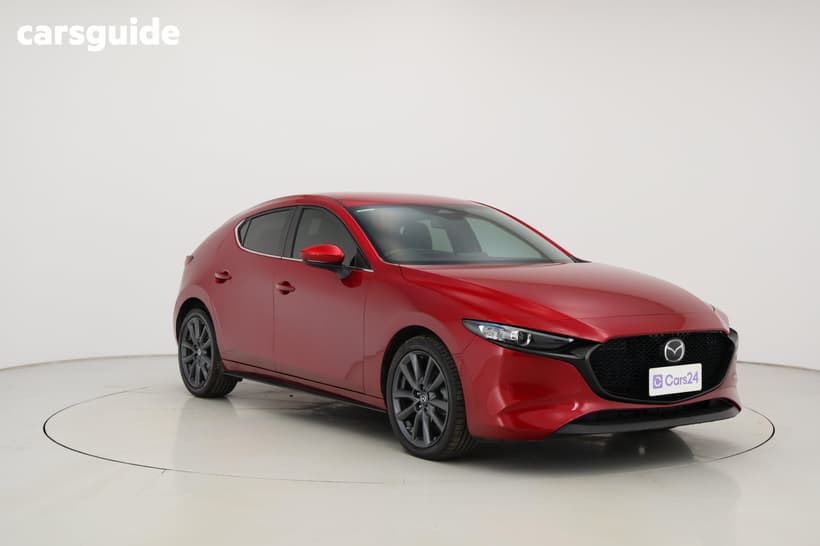 Red 2024 Mazda 3 Hatchback G20 Evolve
