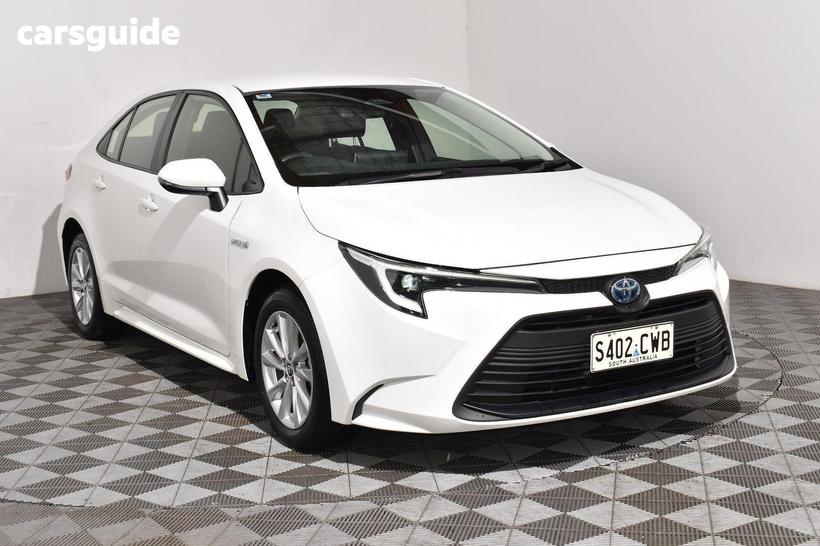 White 2023 Toyota Corolla Sedan Ascent Sport Hybrid