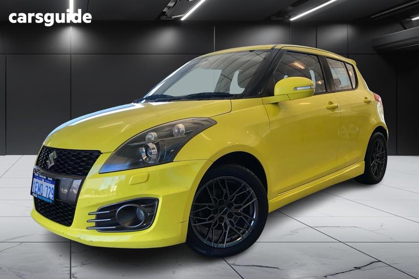 Yellow 2014 Suzuki Swift Hatchback Gl Navigator