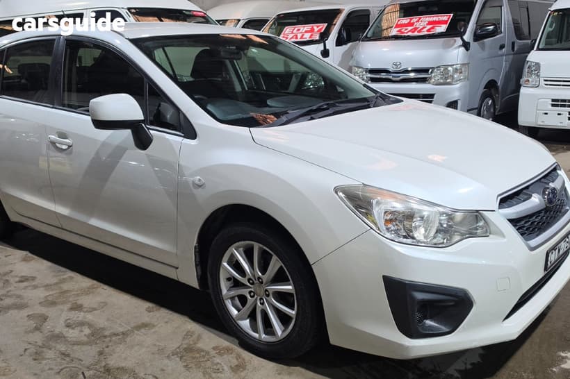White 2014 Subaru Impreza Hatchback 2.0I (Awd)