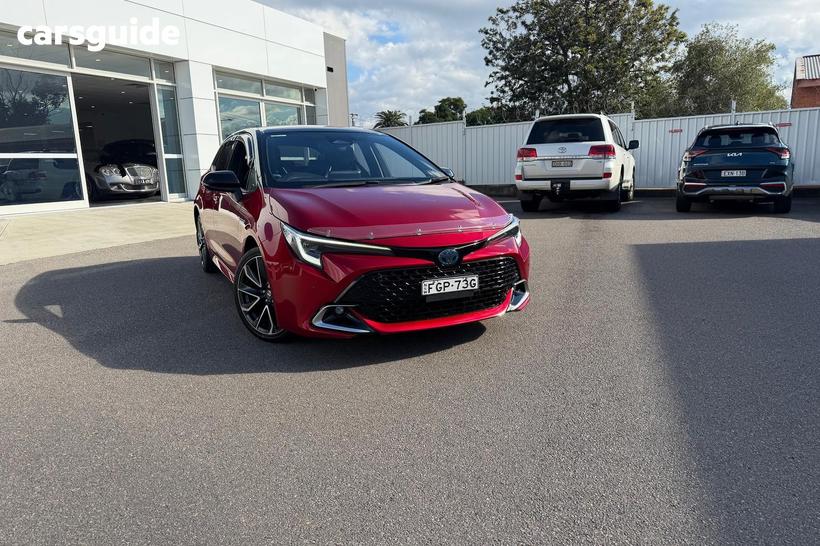 Red 2024 Toyota Corolla Hatchback Zr Hybrid